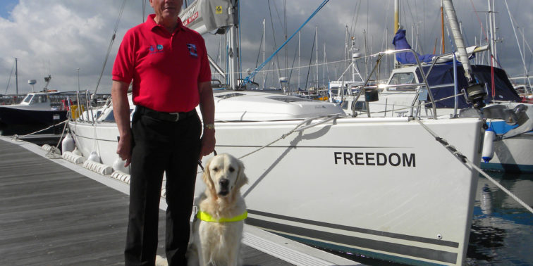 Man & his guide dog going sailing